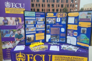 tabling event for CES3 for the earth day festival full with flyers and information about the center