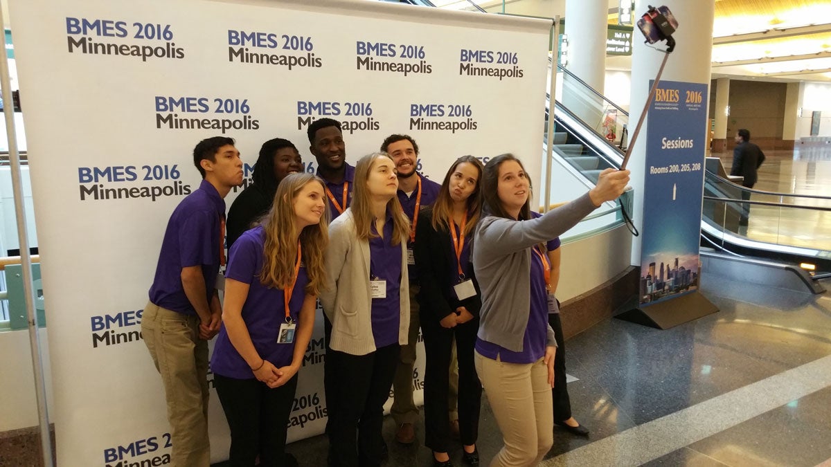 Group of students in front of a BMES 2016 Minneapolis background
