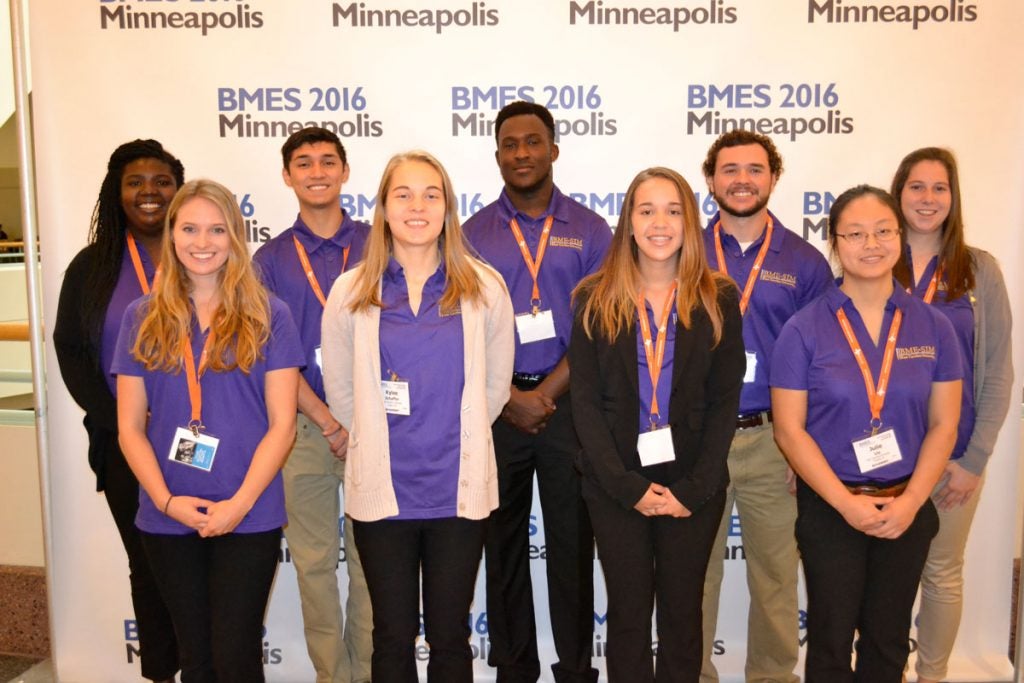 Group of students in front of a BMES 2016 Minneapolis background