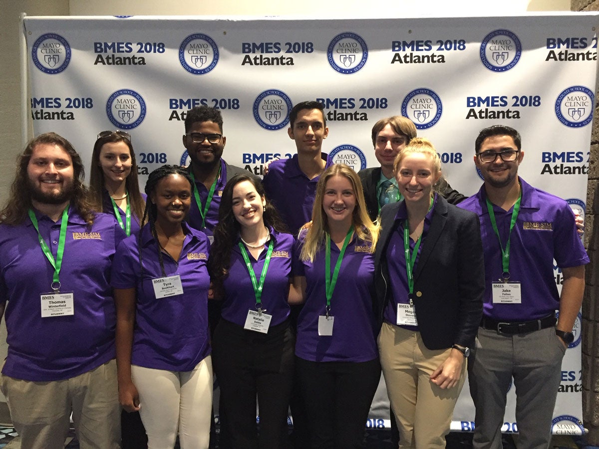 Group of students in front of BMES 2018 Atlanta background