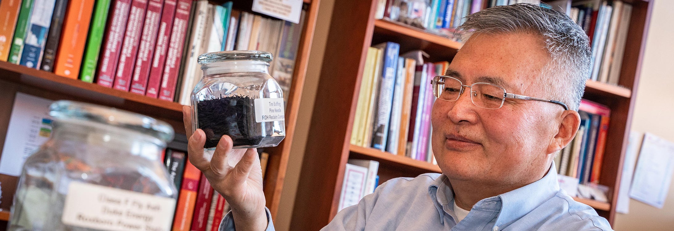 The Department of Construction Management’s Dr. George Wang is researching the feasibility of using recycled concrete and other alternative materials to make new concrete. (Photo by Cliff Hollis) 