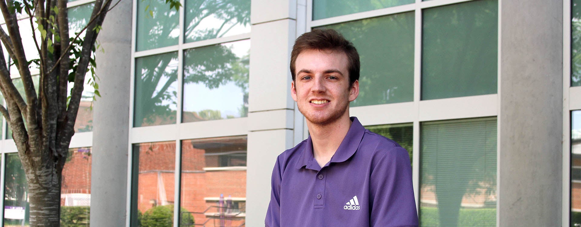 Jack Hanley is East Carolina University's first graduate in the Bachelor of Science in software engineering program. (Photo by Ken Buday)