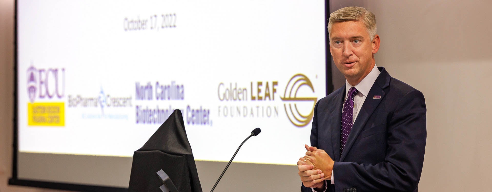 Chancellor Philip Rogers speaks during a ceremony honoring the Golden LEAF Foundation's support of ECU on Monday in the Life Sciences and Biotechnology Building. (Photos by Cliff Hollis)
