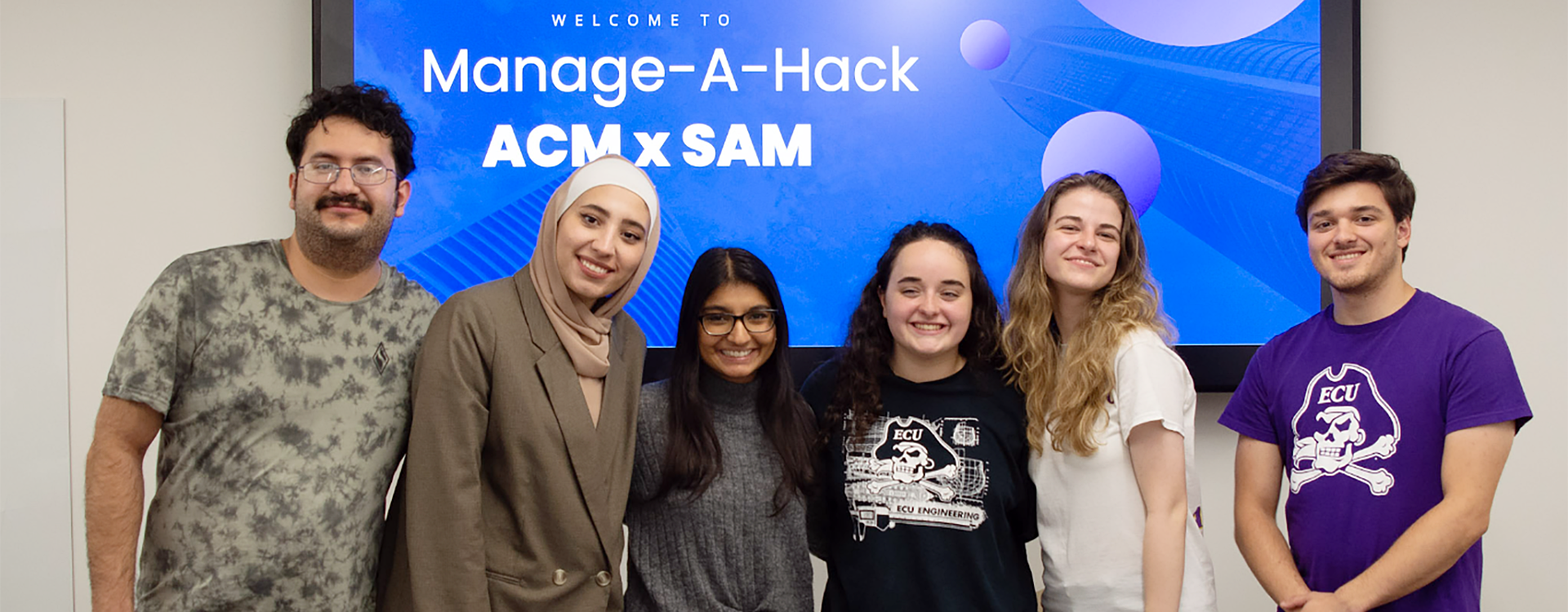 Students with ECU's chapters of the Association for Computing Machinery and the Society for Advancement of Management came together for Manage-A-Hack, an event that has garnered some international attention. (Contributed photo)