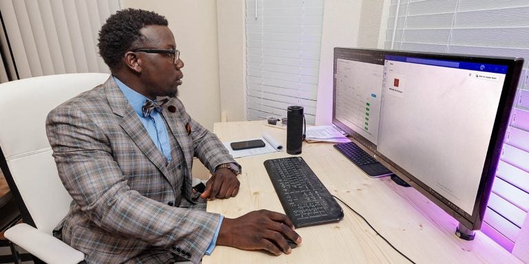 Byron Ohanjo, a Charlotte resident, takes classes as part of ECU's Bachelor of Science in Industrial Technology program online. He said the program met his needs for an accredited, online academic program that fit into his budget. (Photo by Cliff Hollis)