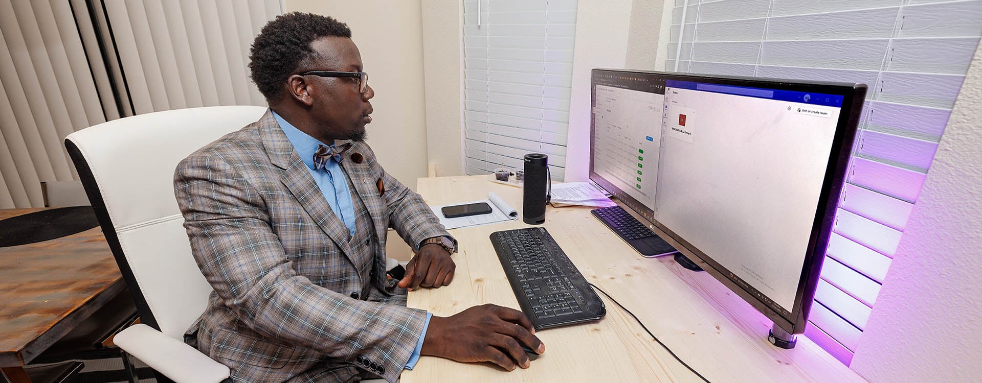 Byron Ohanjo, a Charlotte resident, takes classes as part of ECU's Bachelor of Science in Industrial Technology program online. He said the program met his needs for an accredited, online academic program that fit into his budget. (Photo by Cliff Hollis)