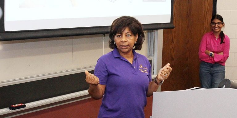 East Carolina University computer science graduate and retired IBM executive Angela Allen speaks to students during the Association of Computing Machinery meeting at the Bate Building. (Photos by Ken Buday)