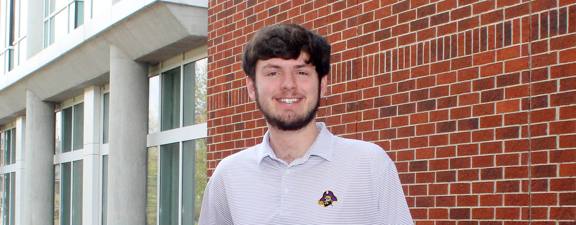 ECU engineering student James Miller has received a SMART scholarship from the Department of Defense. The service for scholarship program will send Miller to Fleet Readiness Center East at Marine Corps Air Station Cherry Point for internships, and eventually, full-time employment. (Photo by Ken Buday)